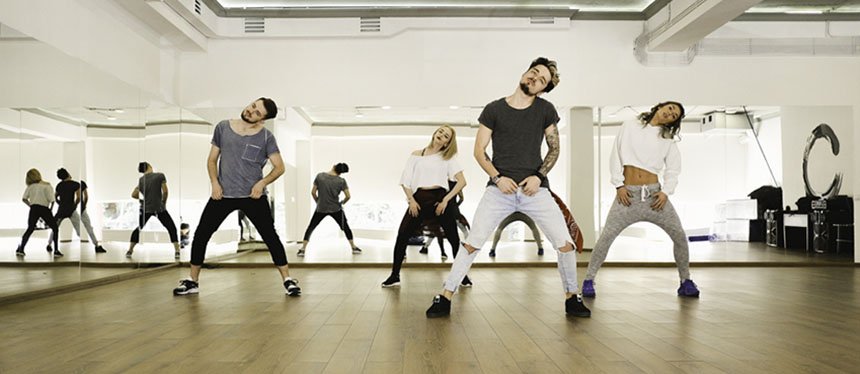 dancers stretching in a dance studio