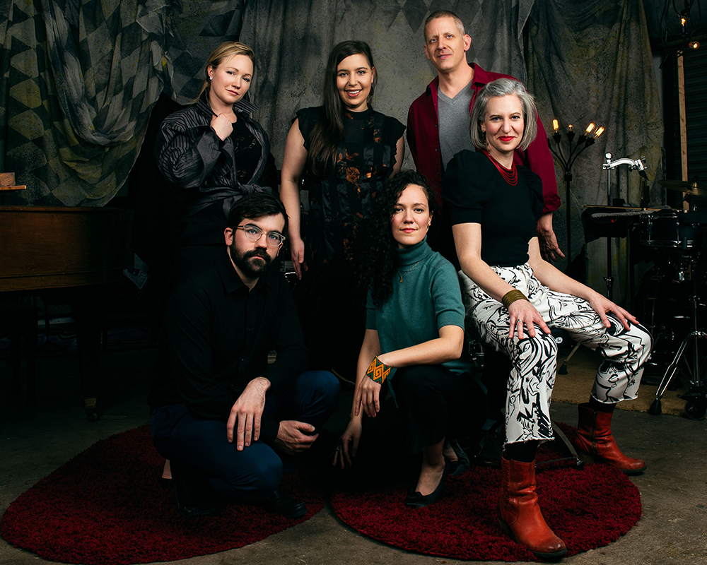 Eighth Blackbird's six members posing in their home studio in Chicago