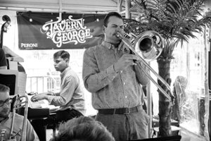 man playing instrument